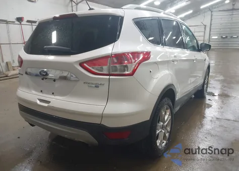 2014 Ford Escape Titanium z USA, uszkodzony, nr VIN 1FMCU9J90EUD21552